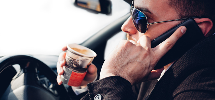 Man driving distracted 